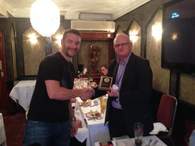 Curry night, May 2014: Stuart Birnie presented with trophy by John Wheatley