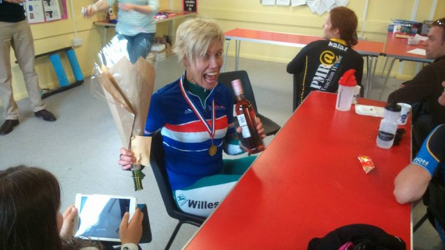 Jane with her Master's Jersey and gold medal. 